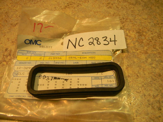NEW Johnson Evinrude OMC SEAL-EXH HSG