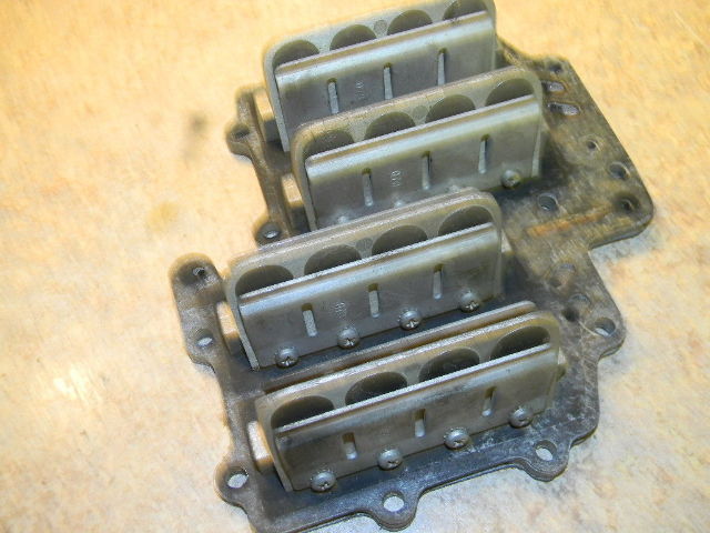Johnson Evinrude reed valve plate from a 1966 60 hp