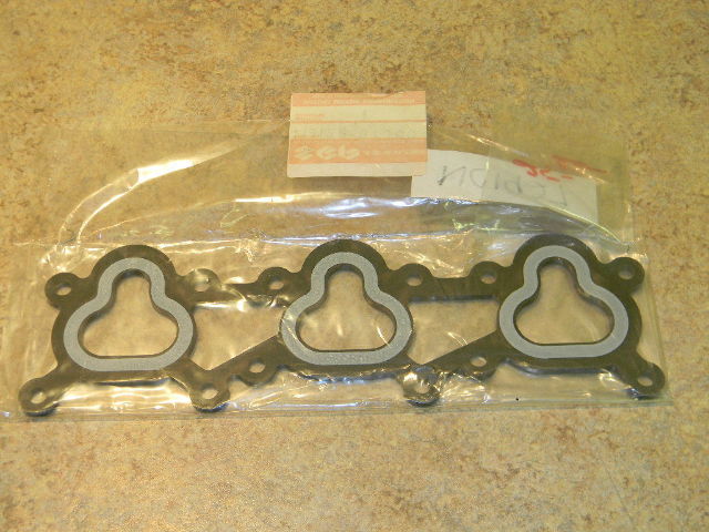 NOS Suzuki Marine Outboard Intake Manifold Insulator 13129-87J00