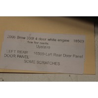 2006 BMW 330i Left Rear Door Panel Dakota Terra Some Scratches, Missing Molding