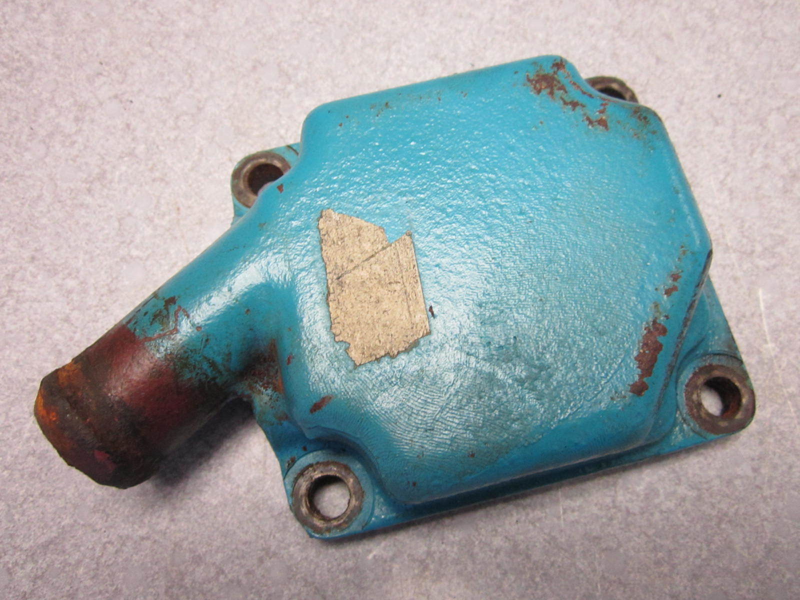 0910384 OMC Stringer 4 Cylinder Manifold Cap 120 140 Hp