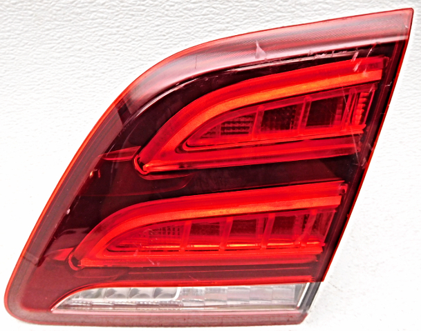 Blemished Lens surface is nice, but has a small lens chip in corner (see photos). Genuine OEM part.** ### Photos ![